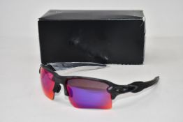 A pair of as new Oakley Flak 2.0 sunglasses.