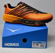 A pair of as new Hoka One One Speedgoat 4 trainers (UK 11.5).