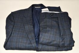An as new Canali lined suit (Size 48? - RRP £870).