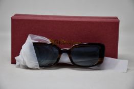 A pair of as new Gigi Studios Fedra sunglasses.