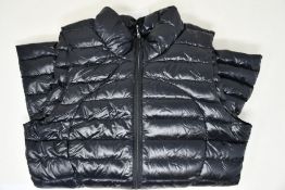 An as new LuluLemon Pack It Down vest (Size 4 - RRP £148).