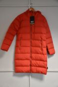 An as new Jack Wolfskin Crystal Palace coat in coral red (S - Slight dirt mark around hood when