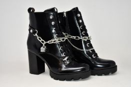A pair of as new Guess Raziel boots (UK 7 - No box lid).