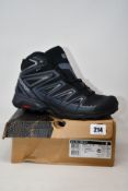 A pair of as new Salomon X Ultra 3 Mid GTX boots (UK 9).