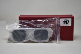 A pair of as new Gigi Studios Parsons sunglasses.