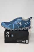 A pair of men's as new On Running Cloud waterproof trainers (UK 10).