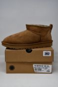A pair of as new Ugg Classic Ultra Mini (UK 6).