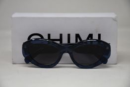 A pair of as new Chimi sunglasses.