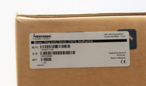 A boxed as new Intermec DX4A2111100 4 Bay CN70 Barcode Scanner Cradle Charger (Box sealed).