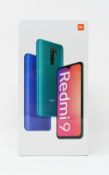 A boxed as new Xiaomi Redmi 9 4GB/64GB in Ocean Green (Box Sealed).