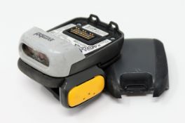 A pre-owned Symbol RS507 Bluetooth Ring Barcode Scanner (P/N: RS507-IM200000TWR) with battery.