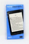 A boxed as new Amazon Kindle Paperwhite 10th Gen 8GB Wi-Fi in Black (Box sealed).