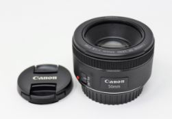 A boxed as new Canon EF 50mm f/1.8 STM Lens.