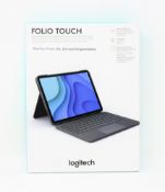 A boxed as new Logitech Combo Touch Case for iPad Pro 11