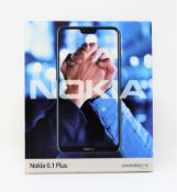 A boxed as new Nokia 6.1 Plus 4GB/64GB in Blue (Box sealed. Two pin plug).