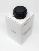 A boxed as new Canon EF-EOS R 0.71x Mount Adapter.