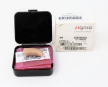 An as new Signia Contrast S+ Hearing Aid in Beige (REF: 10949268).