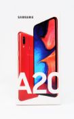 A boxed as new Samsung Galaxy A20 32GB 3GB SM-A205F/DS in Red (Box sealed. Two pin plug).