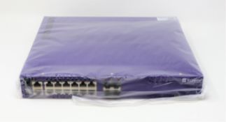 A boxed as new Extreme Networks 16531 X440-G2-12P-10GE4 24-Port Managed Switch (Box opened, damage