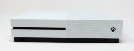 A pre-owned Xbox One S 1TB games console in white (console only - no cables or controllers).