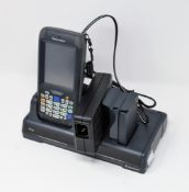 A pre-owned Intermec CN70 Barcode Scanner (M/N: 1000CP01U) with Intermec 852-920-001 Charging