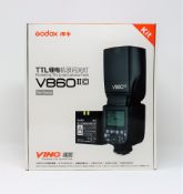 A boxed as new Godox VING V860IIC TTL Li-Ion Flash Kit for Canon Cameras (Box opened. Two pin plug