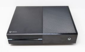 A pre-owned Xbox One 500GB console in black (model 1540) (includes power brick) (no controller) (
