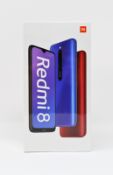 A boxed as new Xiaomi Redmi 8 3GB/32GB in Sapphire Blue (Box sealed. Two pin plug).