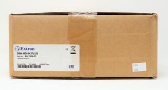 A boxed as new Extron SW-HD-4K-PLUS Four Input 4K/60 HDMI Switcher (P/N: 60-1604-01) (Box sealed,