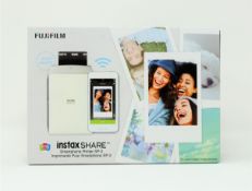 A boxed as new Fujifilm SP-2 Instax Share Printer in Silver.