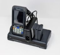 A pre-owned Intermec CN70 Barcode Scanner (M/N: 1000CP01U) with Intermec 852-920-001 Charging