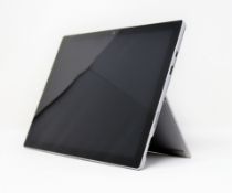 FAULTY - SOLD FOR PARTS - A pre-owned Microsoft Surface Pro 4 (model: 1724) with Intel Core M3-