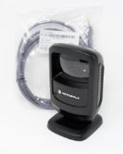 A pre-owned Motorola DS9208 Barcode Scanner with as new cable.