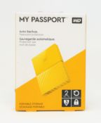 A boxed as new WD My Passport 2TB in Yellow (Box sealed).