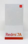 A boxed as new Xiaomi Redmi 7A 2GB/32GB in Matte Black (Box sealed. Two pin plug).