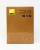 A boxed as new Nikon SB-R200 Wireless Remote Speedlight Flash.