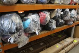 Eleven bags of pre-owned clothing and related items.