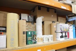 A large quantity of mugs, bottles and other related items.