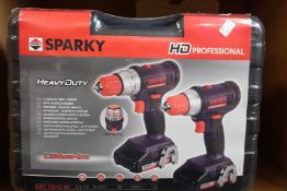 Three boxes of as new Sparky professional heavy duty drill sets.