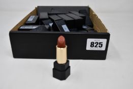 Twenty seven Suqqu sheer matte lipsticks in various shades.