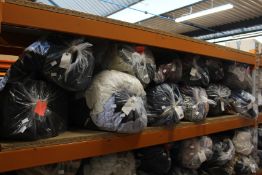 Twelve bags of pre-owned clothing and related items.