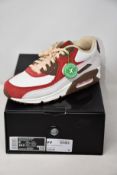A pair of as new Nike Air Max 90 NRG with authentication tag (UK 8).