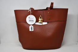 A pre-owned Chloe tote bag in sepia brown with matching pouch (Good condition, mark on base of bag