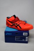 A pair of as new Asics Javelin Pro trainers (UK 8).