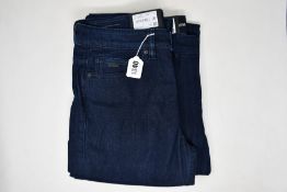 Two pairs of as new Hugo Boss jeans (W31/L32).