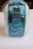An as new Geni-Store portable car oxygen concentrator (RRP £1000) (Requires UK plug adaptor).