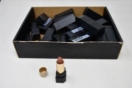 Twenty seven Suqqu sheer matte lipsticks in various shades.