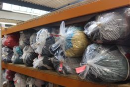Twelve bags of pre-owned clothing and related items.