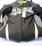 A 4SR Racing Power AR motorcycle racing suit in black (UK 42) and a pair of as new 4SR gloves (M),