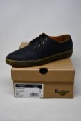 A pair of as new Dr Martens Coronado shoes (UK 10).